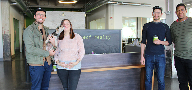 Marc, John, Jeremy at OCF Realty's front desk