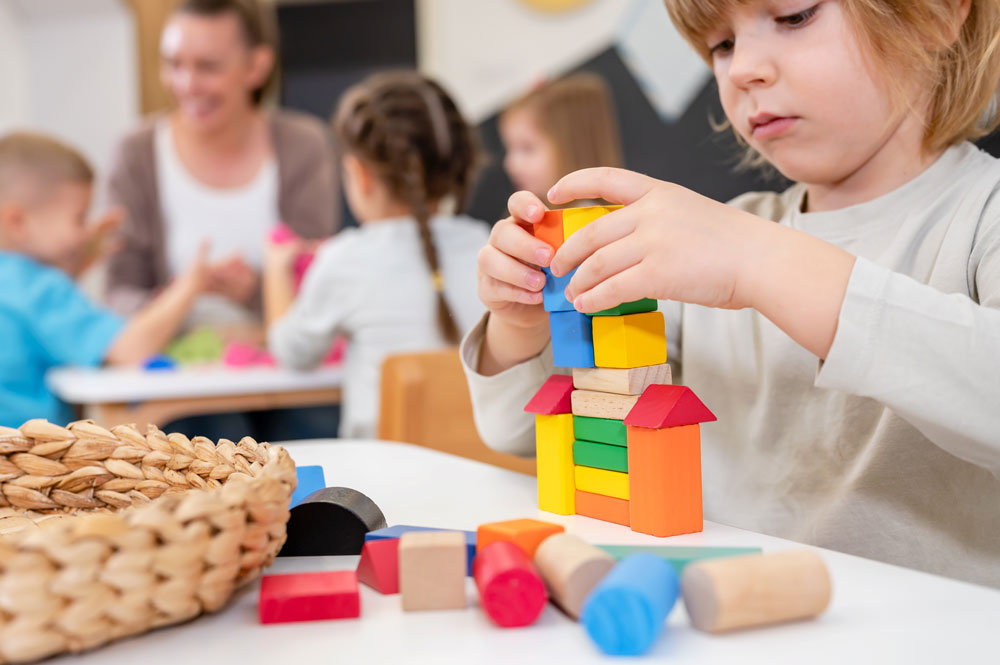 Child playing with wooden blocks